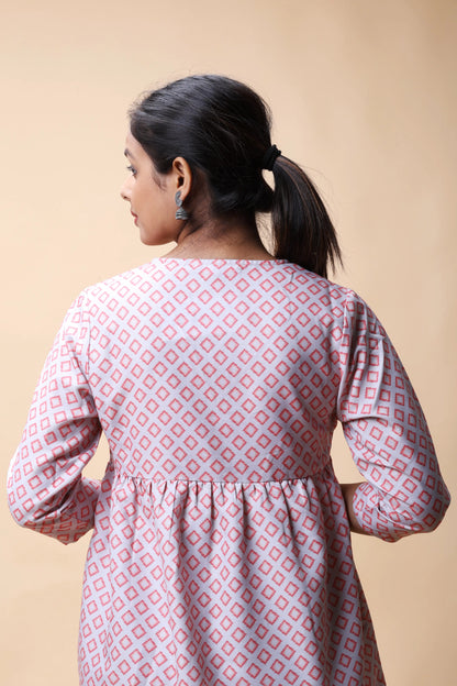 Shop Pink Ikkat Print Peplum Short Kurti For Women online at allthere.in