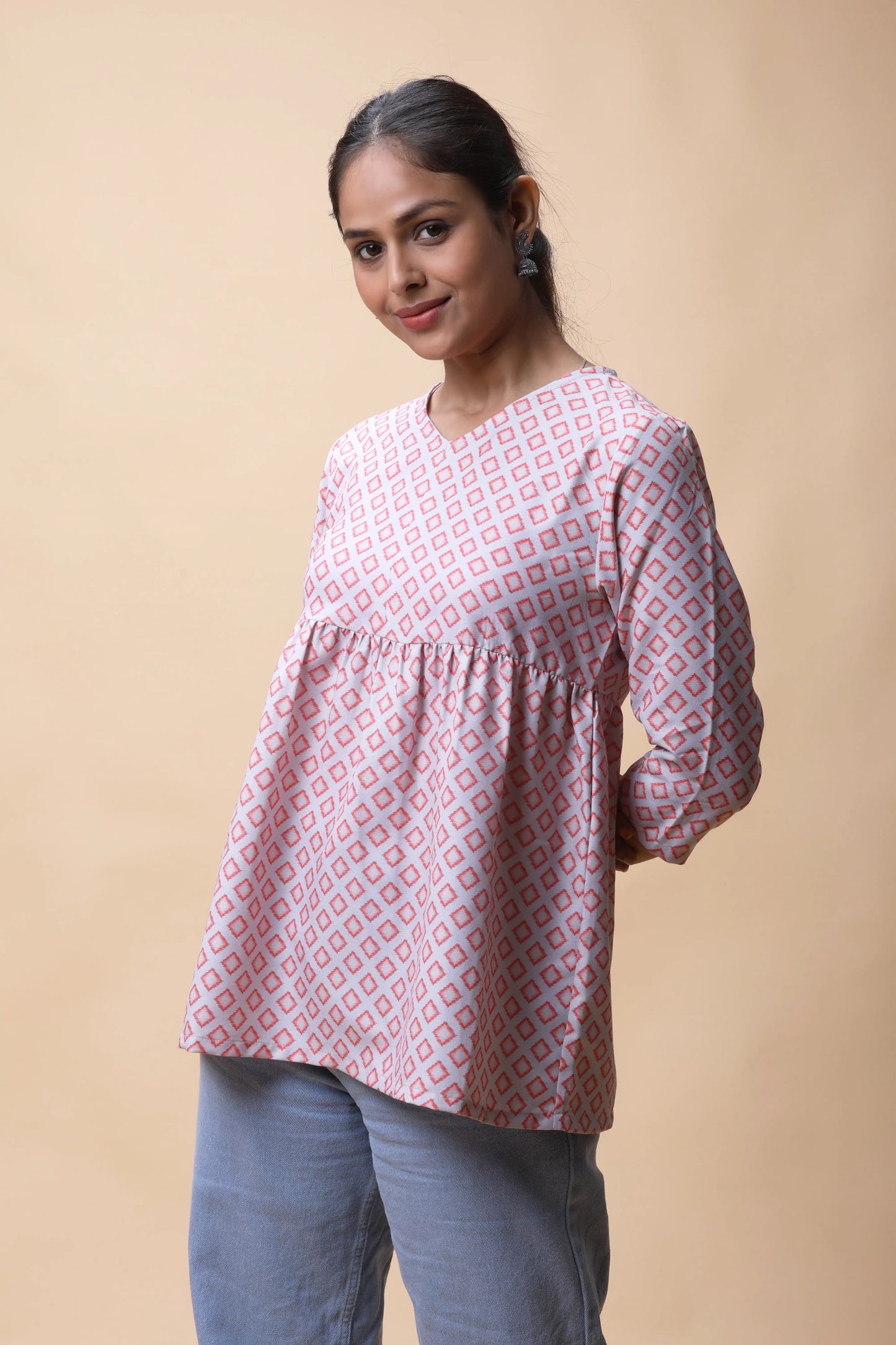 Shop Pink Ikkat Print Peplum Short Kurti For Women online at allthere.in